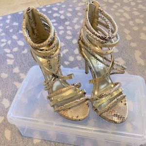 Bebe gold snakeskin strappy heels; worn once size 5.5